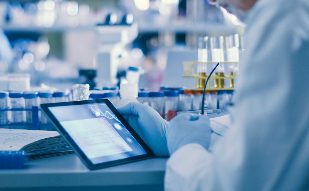 lab worker using an ipad