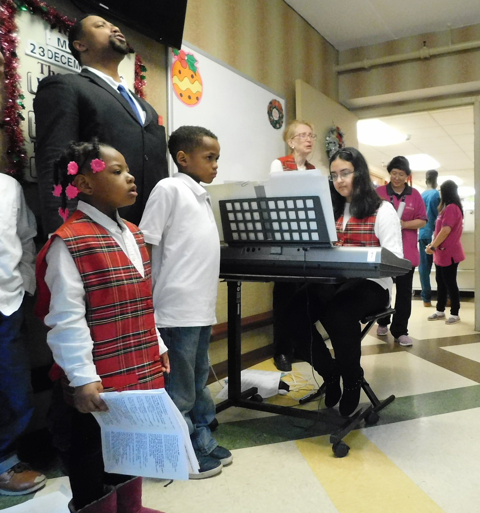 kids performing music with adults