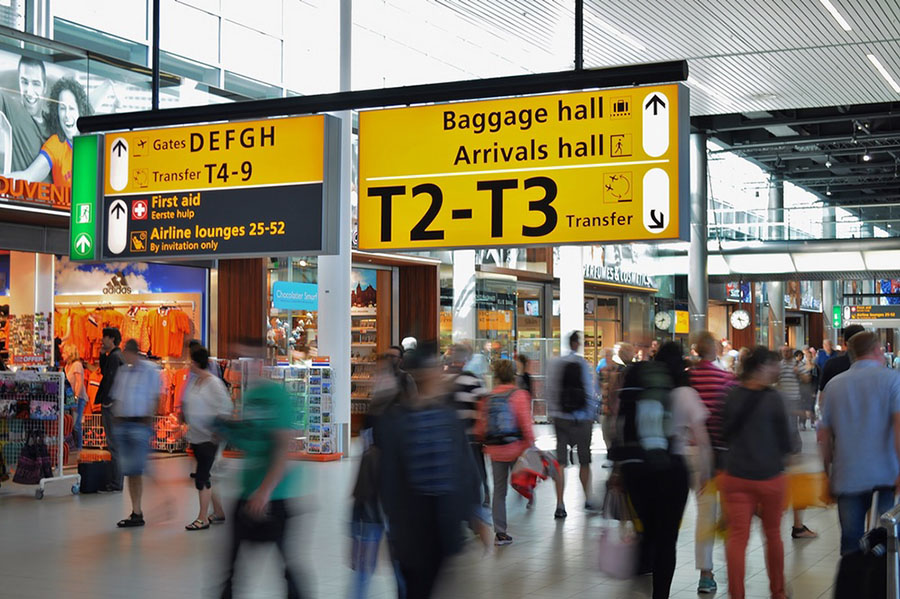 people walking in an airport