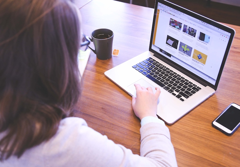 woman looking at translation memory on computer