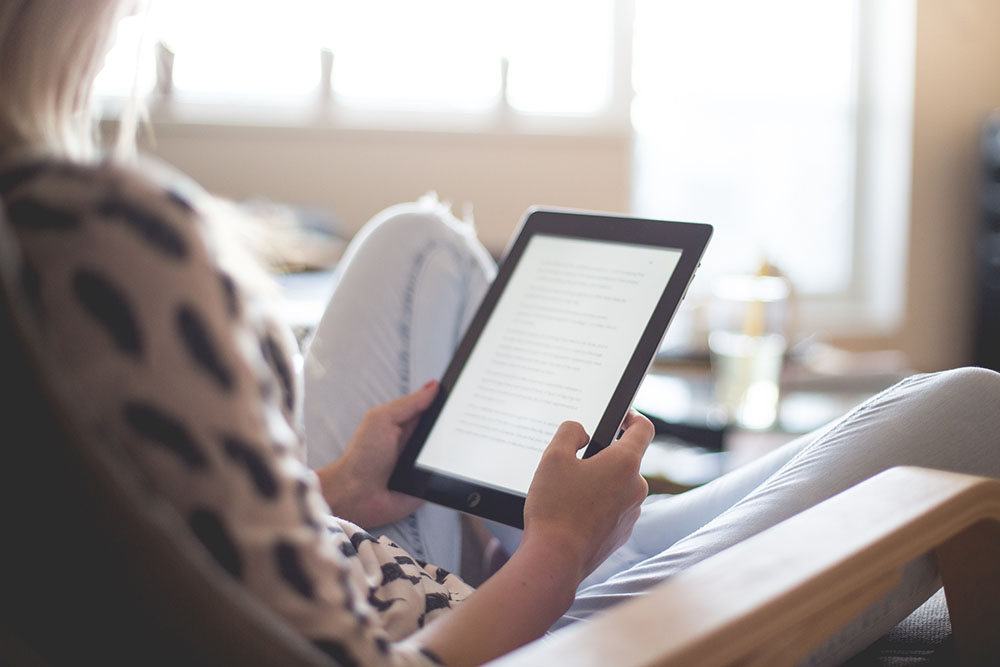 woman reading an ebook