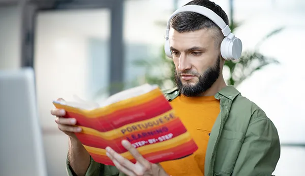 man learning Portuguese 